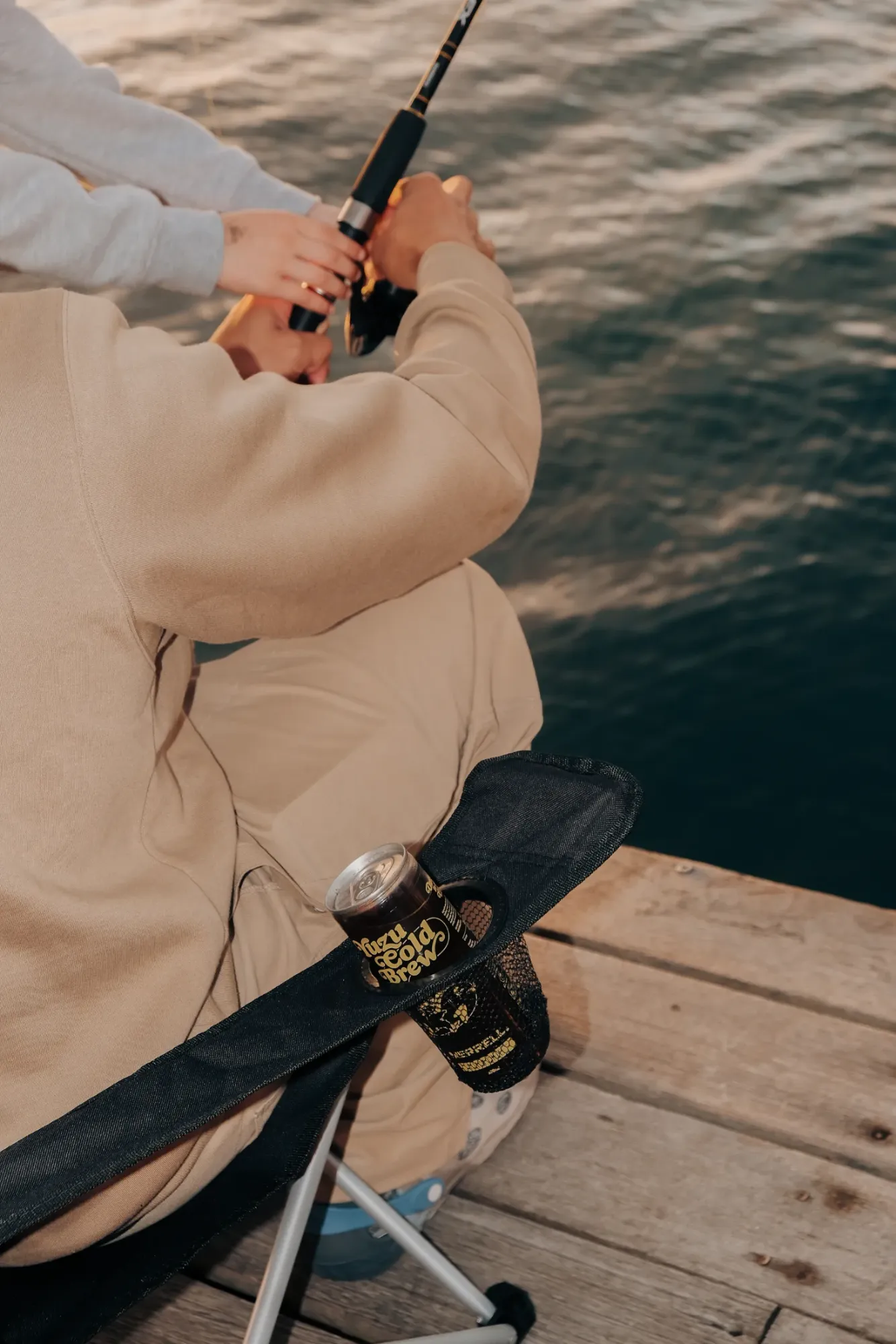 Cold brew can in the camp chair cup holder