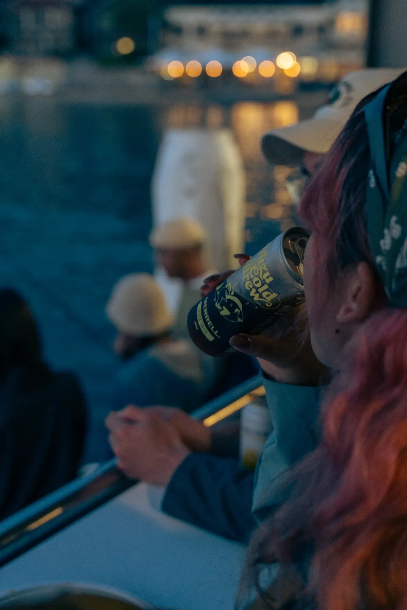 Drinking cold brew on the boat at dusk